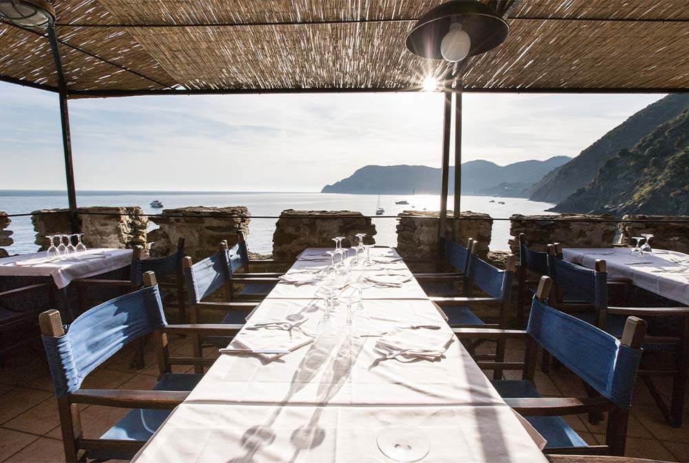 tables on top tower at belforte restauarant sunset view